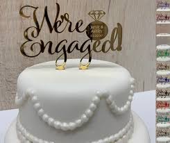 The lehenga is full length and has all the eligibility to be your perfect lehenga for engagement ceremony. We Re Engaged Cake Topper Personalised Couples Names Etsy Engagement Party Cake Engagement Cake Toppers Engagement Cake Design