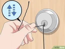 Insert the two points of the bobby pin into the lock. How To Open A Locked Door With A Bobby Pin Bobby Pins Picking Locks Bobby Pins Bobby