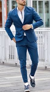 The first is that you can pretty much wear any color tie with a blue suit. Aqua Blue Suit With White Shirt And Blue Sneakers Wedding Groomsmen Suits Mensfashion Bespoke The Suits And Sneakers Mens Fashion Suits Men Suit Fashion