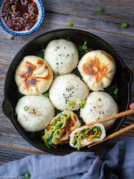 Use a little oil (we used olive oil in but you can use whatever oil you like) to wet your hands and make small balls of dough. How To Make Pan Fried Steamed Buns Sheng Jian Bao Woonheng