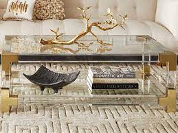 Mygift's small, multipurpose, acrylic end table could also be used as an unusual nightstand, a side table, a plant stand, or as bathroom storage. Jonathan Adler Jacques Clear Brass 50 Wide Rectangular Coffee Table Jon26317