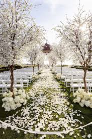 Romantic White Wedding At Pelican Hill With Dreamy Cherry Blossom Trees Modwedding Garden Weddings Ceremony Outdoor Wedding Wedding Reception Backdrop