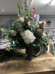 Make sure to choose a trustable florist to buy the best flower arrangement. Dinner Party Arrangement Blossom Hill Flowers Danbury Essex