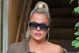Khloe kardashian keeps it casual in these jeans | celebrity style guide. Khloe Kardashian In Good American Boots And Workout Bra Set Footwear News