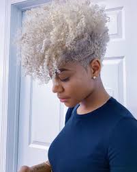 We love the long bangs and styled sideburns of this look. Short Natural Haircuts For Black Females