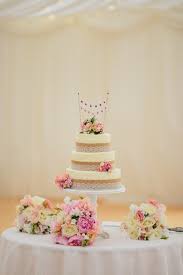 Rustic Wedding Cake Hessian And Lace Burlap Bunting Cake Topper Fresh Flowers Wedding Cake Rustic Rustic Wedding Cake Themed Wedding Cakes