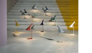 This staircase also features the use of mixed media materials. Aj Royal Family Of Lamps By Arne Jacobsen Louis Poulsen