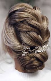 They differ from cornrows because they aren't braided flat against the scalp. 39 The Most Romantic Wedding Hair Dos To Get An Elegant Look Braided Updo