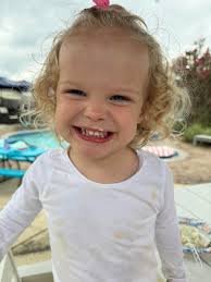 Hello; my daughter took this picture and I really love it but the mirror is  mucky obscuring her lovely face a little. Is there anyway to clean it up  please? And make