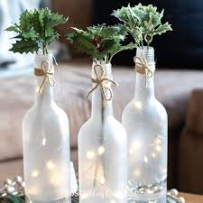 Wine bottles are a cheap, creative method of reinterpretation of a centerpiece. Frosted Wine Bottle Centerpiece Idea And Blog Hop Sustain My Craft Habit