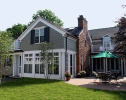 Black And White House With Red Brick Exterior Rear Red Brick Exteriors Brick Exterior House Exterior Brick