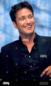 Gerard butler lara croft tomb raider hi-res stock photography and images