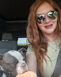 Me and Pickle after a long day gator hunting! I hope she killed it this  year