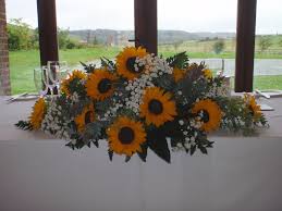 Top Table Decoration With Gorgeous Sunflowers Gypsophila And Foliage Sunflower Centerpieces Sunflower Wedding Centerpieces Rustic Sunflower Centerpieces