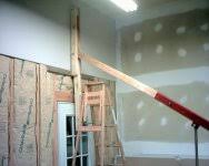 Lift the door and place into the opening ensuring that you have a good squeeze out with the sealant. Homemade Drywall Lift Anyone Build One The Garage Journal