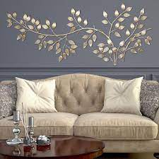 With an attractive distressed dark brown finish, this. Stratton Home Decor Flowing Leaves Metal Wall Decor Metal Wall Decor Living Room Wall Decor Living Room Wall Decor Bedroom