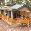 The home's exterior is made from cedar lap siding, and. 1