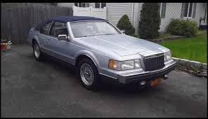Image result for Silver 1990 Lincoln