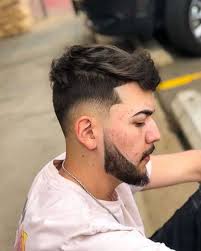Taper fade with part and long hair. 40 Awesome Low Fade Haircuts For Trendsetters 2021 Guide