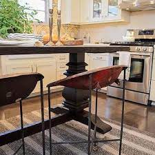 Shapes and sizes of dining tables, chairs and furniture need to be considered so personal movement is not impeded when the room is fully in use. Kitchen Island On Risers Design Ideas