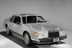 Image result for Silver 1990 Lincoln