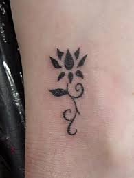 Small Black Lotus Flower Tattoo On Ankle Tattoobite Com Flower Tattoo On Ankle Tribal Wrist Tattoos Tattoos For Women Flowers