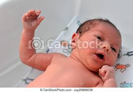 Your baby's first bath is one of the earliest milestones in your parenting journey, and a moment to treasure. Newborn Baby First Bath Little Newborn Baby 14 Days Old Having His First Bath At Home Canstock