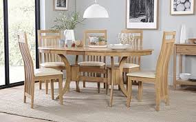 Dining table oak oval t in solid natural oakwood and with lacquered iron base. Oval Table Chairs Oval Dining Sets Furniture And Choice