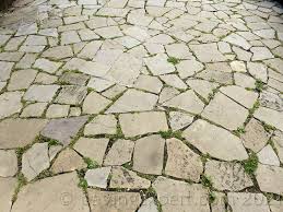 We are often asked whether it is possible to lay artificial lawn on top of concrete paving slabs. Crazy Paving Pavingexpert