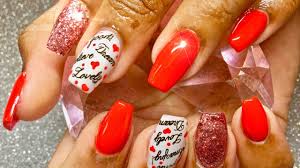 Floral acrylic nails are never out of style and this design will prove that! Black Gel Nails With Red Glitter Nail And Manicure Trends