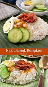 This is the best and most authentic nasi lemak bungkus, malaysia's most popular breakfast now with sambal udang (prawn sambal). Nasi Lemak Bungkus Coconut Flavored Rice With Spicy Anchovies Wrapped In Banana Leaves Roti N Rice