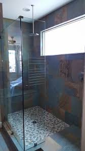 Large Walk In Shower With Heated Floors Pebble Floor Slate Tile And Rain Head Shower Fixture Beautiful Bathrooms Shower Fixtures New Home Construction