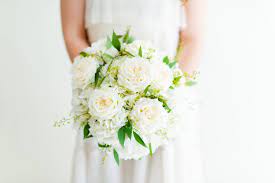 These creamy white blooms give off the elegance of lace and are full of fairytale character. English Garden Bridal Bouquet Flower Moxie