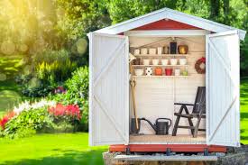The faded green paint pays homage to what has probably been many years of loyal service that this shed has provided its owner. Diy Backyard Storage Ideas Best Backyard Landscape Supplies