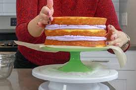 Gently slide in or lower the egg rolls, frying 4 to 6 at a time, turning occasionally until golden brown about 1½ minutes. How To Make A Layer Cake Crumb Coat Fill Frost Baker Bettie