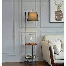 Young man using digital tablet while drinking coffee sitting at home garden, relaxing in the morning. Gaoxingshop Floor Lamp Bedside Floor Lamp With Shelves Simple Atmosphere Creative Coffee Table Sofa Lamp Indoor Lighting Aa Color Black White Shade Buy Online In United Arab Emirates At Desertcart Ae Productid 201645643