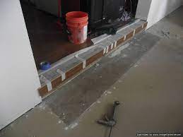 Sunken Living Room Concrete Step Down To Have Laminate Flooring Installed On The Concrete Sunken L Sunken Living Room Transition Flooring Laminate Installation