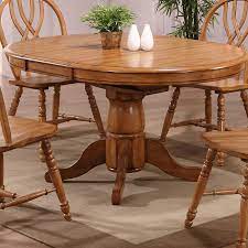 Beachcrest Home Dellinger Extendable Butterfly Leaf Rubber Solid Wood Pedestal Dining Table Revi In 2021 Pedestal Dining Table Dining Table Rustic Side Chairs Dining