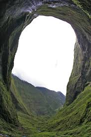Beautiful view of Blue Hole showcasing lush, remote Hawaiian jungle with waterfalls