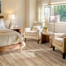 Choose between laminate and carpet for a basement living area with help from a foreman for lighty contractors in this free video clip. Ditch The Outdated Carpet For Hardwood Look Luxury Vinyl Planks