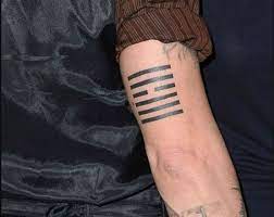Johnny Depp Often Gets Matching Tattoos With His Best Friends He Has Several Matching Tattoos With Mari Back Of Arm Tattoo Johnny Depp Tattoos Back Arm Tattoo