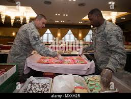 Staff Sgt. Robert Powell (left), 9th Civil Engineer Squadron explosive  ordnance technician, disables a simulated explosive device during Urban  Shield in Dublin, California, Sept. 10, 2017. Beale EOD sent a team to