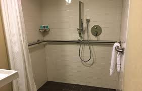 For smaller bathrooms, handicapped showers are available that fit into the corner of the room. What Is A Roll In Shower Pros Cons You Need To Know