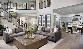 Dreaming to have a luxury house with all the amenities? A Dramatic Two Story Ceiling Adds To The Glamour Of This Elegant Great Room Heidi Plan By Richmond American House Design Living Room Designs Home