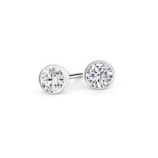 Maybe you would like to learn more about one of these? Bezel Set Round Diamond Stud Earrings In 18k White Gold