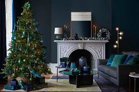 Beauty may sometimes be overrated, but looking at this space with the all white and blue decor, makes you imagine how blue this simple living room is quite ideal for homes with small children, minimal decorations to make sure that choking hazards are avoided. Christmas Tree Decorating Ideas For Every Style And Budget Loveproperty Com