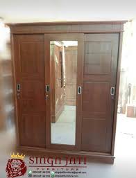 Kayu jati/optional mahoni warna finishing : Lemari Pakaian 3 Pintu Sliding Kayu Jati Model Minimalis