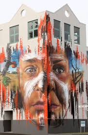 Warrnambool Victoria Australia Melbourne Based Artist Matt Adnate Painted The Indigenous Theme Mural With The M Street Art Australian Artists Aboriginal Man