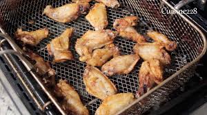 While chicken wings are baking, spray your slow cooker with nonstick spray. Honey Garlic Chicken Wings Cuisine228