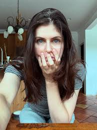 My mom drew this first picture for my birthday. It is very beautiful. It's  Godzilla in a party dress. The second photo is NOT from my mom. Thanks for  the well wishes!